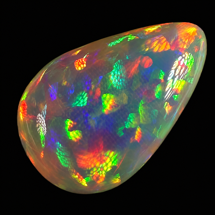 9.88ct AAA quality Natural Ethiopian Welo Opal – Pear Cabochon – Neon Green, Fiery Red & Electric Rainbow Fire – Floral Honeycomb Pattern – AAA Collector Grade