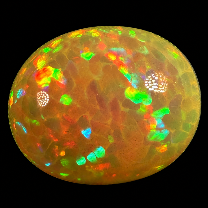 11.17ct AAA quality Natural Ethiopian Welo Opal – Oval Cabochon – Neon Green, Fiery Orange & Electric Red Fire – Broadflash Honeycomb Pattern – AAA Collector Grade