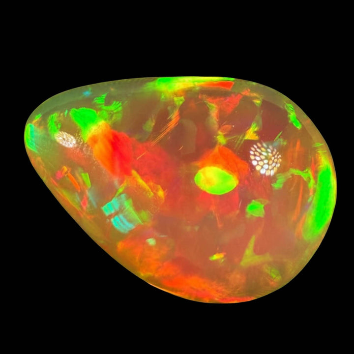 14.32ct AAA quality Natural Ethiopian Welo Opal – Pear Cabochon – Fiery Red, Neon Green & Golden Orange Fire – Broadflash Floral Pattern – AAA Collector Grade