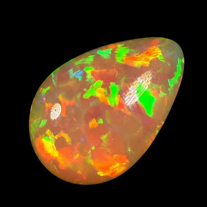 14.32ct AAA quality Natural Ethiopian Welo Opal – Pear Cabochon – Fiery Red, Neon Green & Golden Orange Fire – Broadflash Floral Pattern – AAA Collector Grade