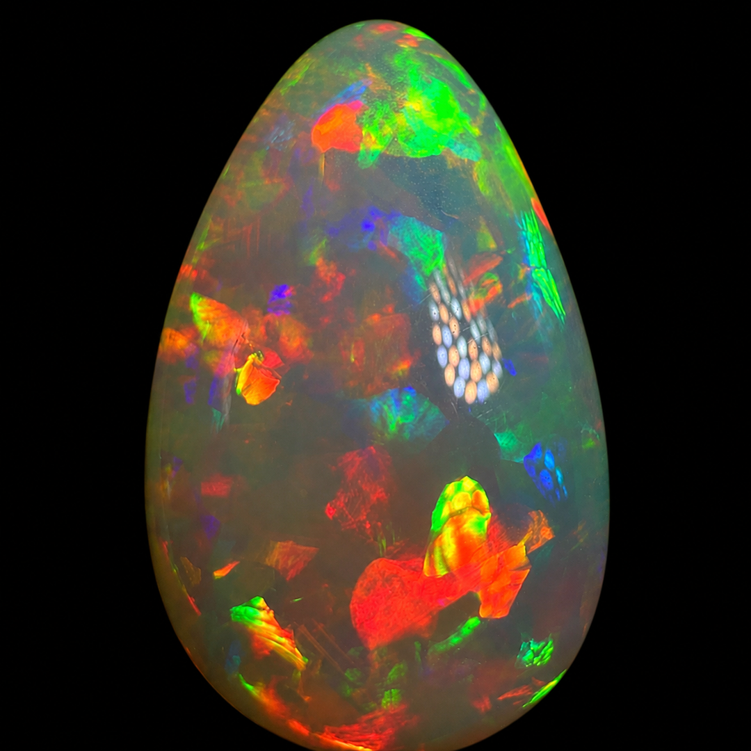 12.37ct AAA quality Natural Ethiopian Welo Opal – Pear Cabochon – Fiery Red, Neon Green & Electric Blue Fire – Mosaic Broadflash Pattern – AAA Collector Grade
