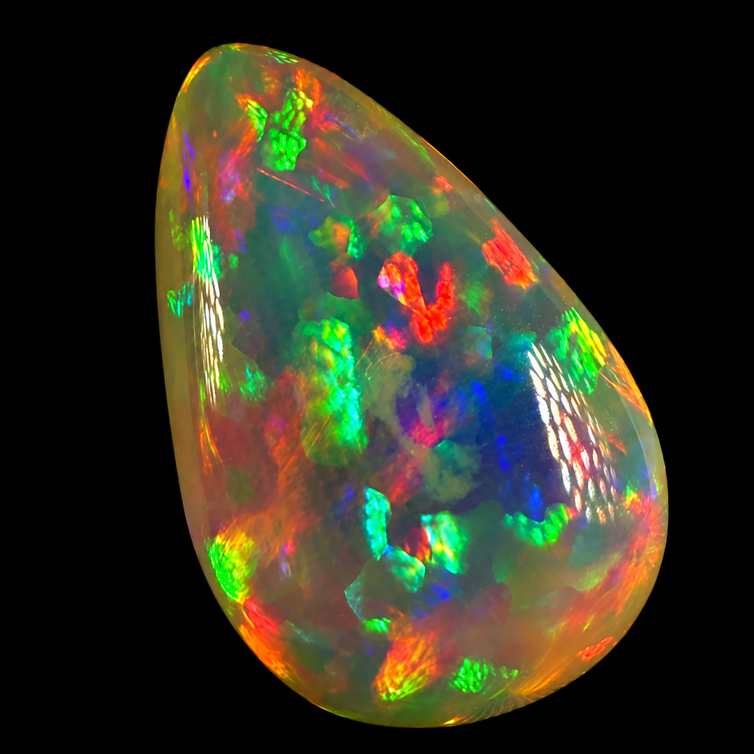 9.88ct AAA quality Natural Ethiopian Welo Opal – Pear Cabochon – Neon Green, Fiery Red & Electric Rainbow Fire – Floral Honeycomb Pattern – AAA Collector Grade